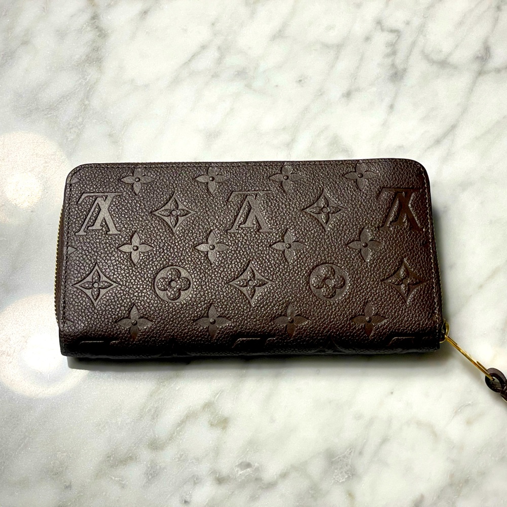 Louis Vuitton monogram implant zippy wallet